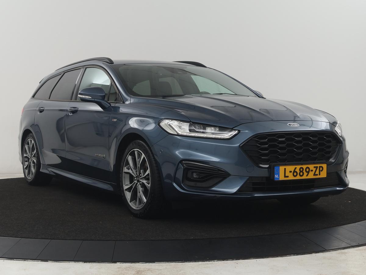 Ford Mondeo Ford Mondeo Wagon 2.0 IVCT HEV St-Line | Leder/alcantara | Memory | Cruise control | Dodehoek detectie | Stuur/stoel verwarming | Achterbank verwarming | Carplay | Camera | Park assist | Elektrische achterklep