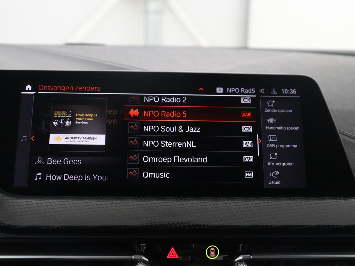BMW 1 Serie BMW 1-serie 118i Business Edition | Half leder | Cruise control | Stoelverwarming | Navigatie | Carplay | Park assist | Climate control | Virtual dashboard | 17″ velgen