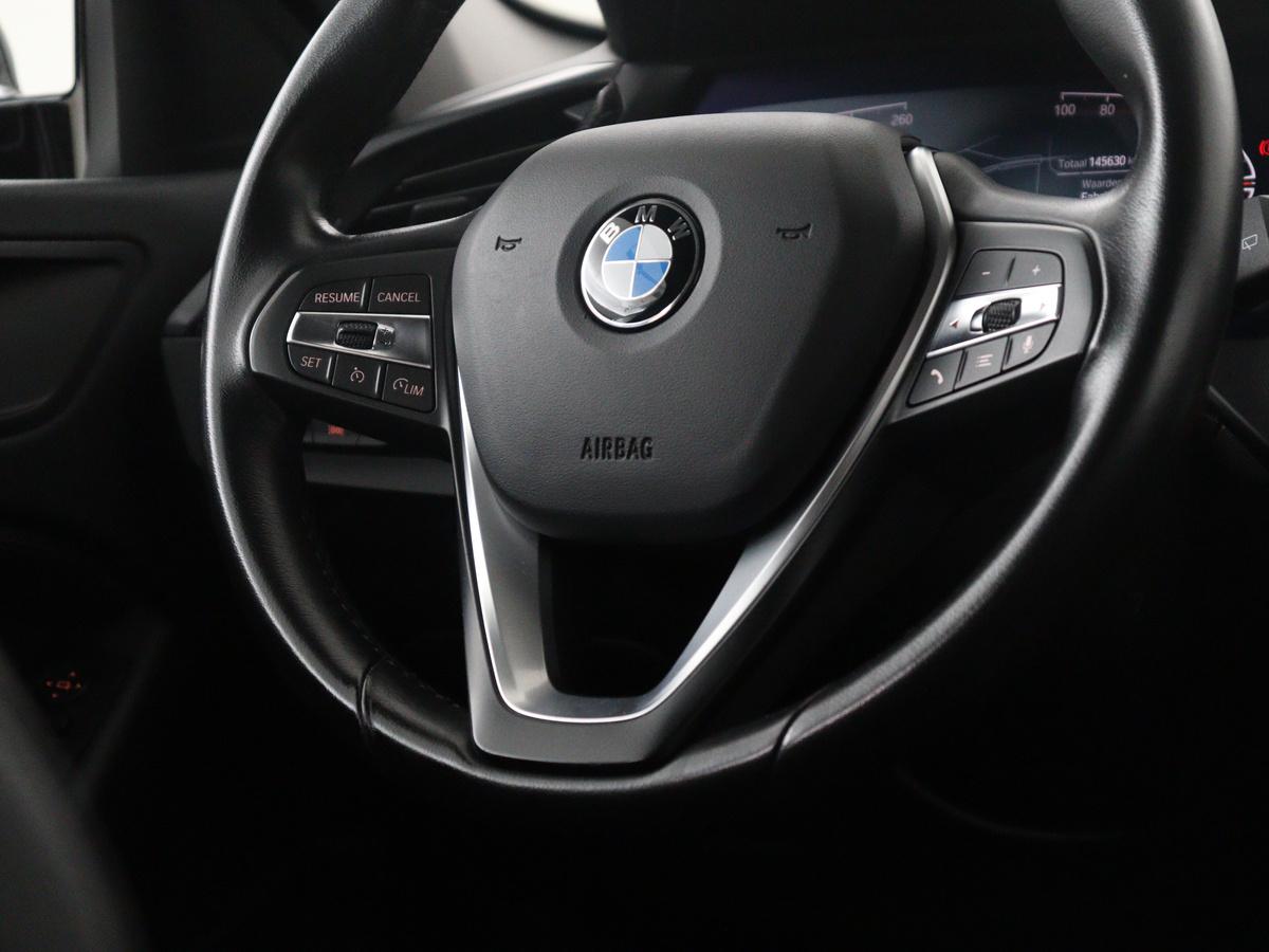 BMW 1 Serie BMW 1-serie 118i Business Edition | Half leder | Cruise control | Stoelverwarming | Navigatie | Carplay | Park assist | Climate control | Virtual dashboard | 17″ velgen