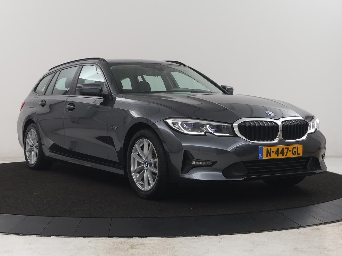 BMW 3 Serie BMW 3-serie Touring 320e Business Edition Plus | SOH 84,2% | Leder | Cruise control |  Stoelverwarming | Climate control | 3 zone klimaat | Navigatie | Bluetooth | Elektrische achterklep | Trekhaak