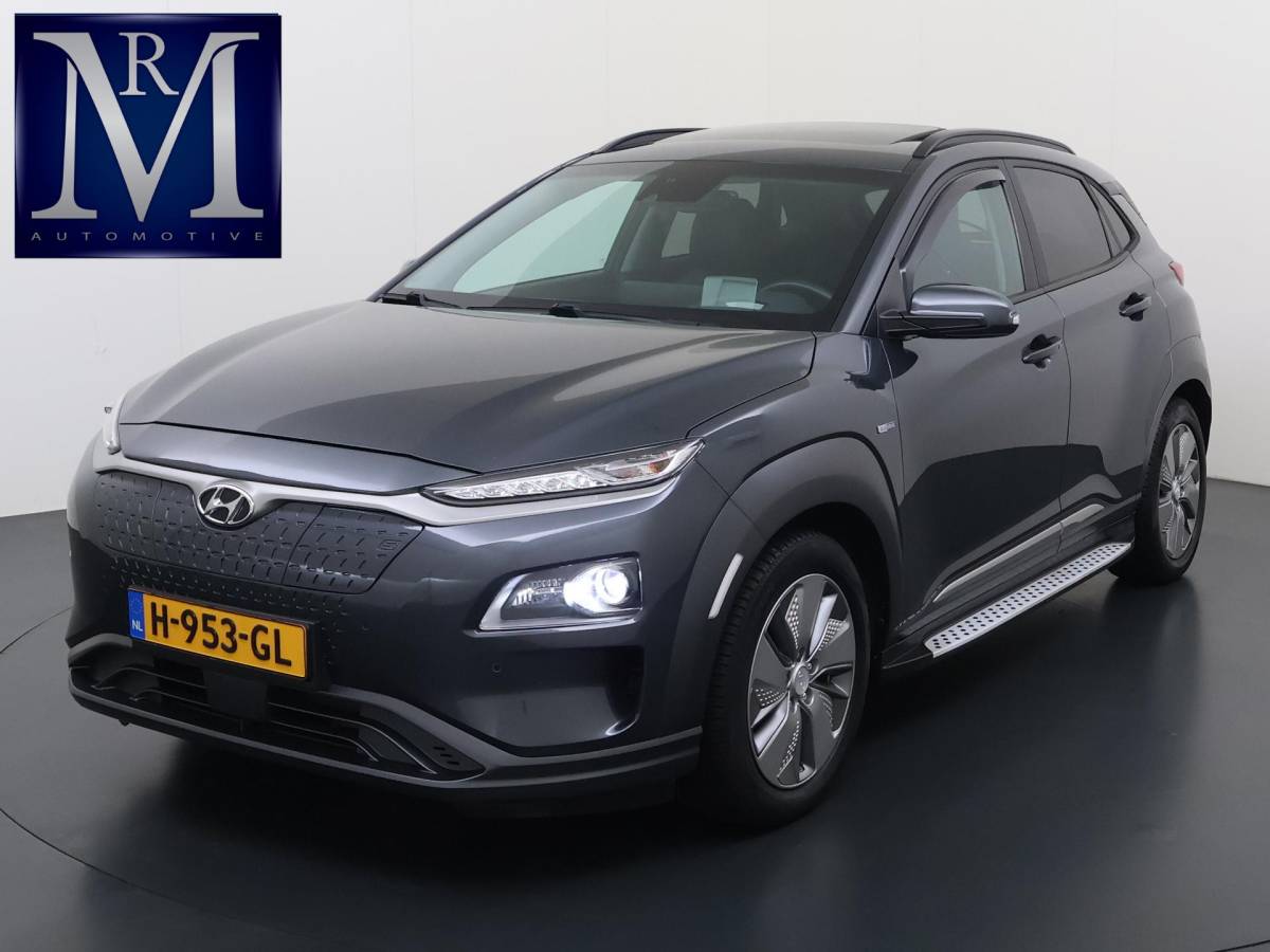 Hyundai Kona Hyundai Kona EV Premium 64 kWh SOH 94% | ORIGINEEL NL AUTO | 3-FASE LADEN | WARMTEPOMP| SCHUIFDAK | LEREN BEKLEDING | STOEL- + STUURERWARMING | KRELL PREMIUM AUDIO | HEAD-UP DISPLAY | STOELVENTILATIE | AFNEEMBARE TREKHAAK | CAMERA | ACHTERBANKVERWARMING | ALL-SEASON BANDEN | HYUNDAI DEALER ONDERHOUDEN | 12 MND. BOVAG GARANTIE