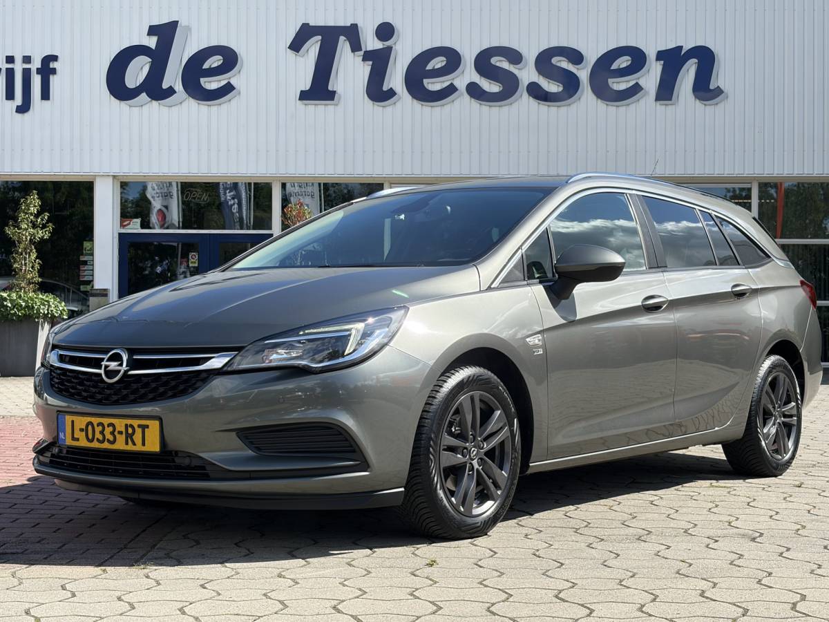 Opel Astra Opel Astra Sports Tourer 1.0 Turbo 120 Jaar Edition | Camera | Navi | Cruise | Rijklaar met beurt & garantie!