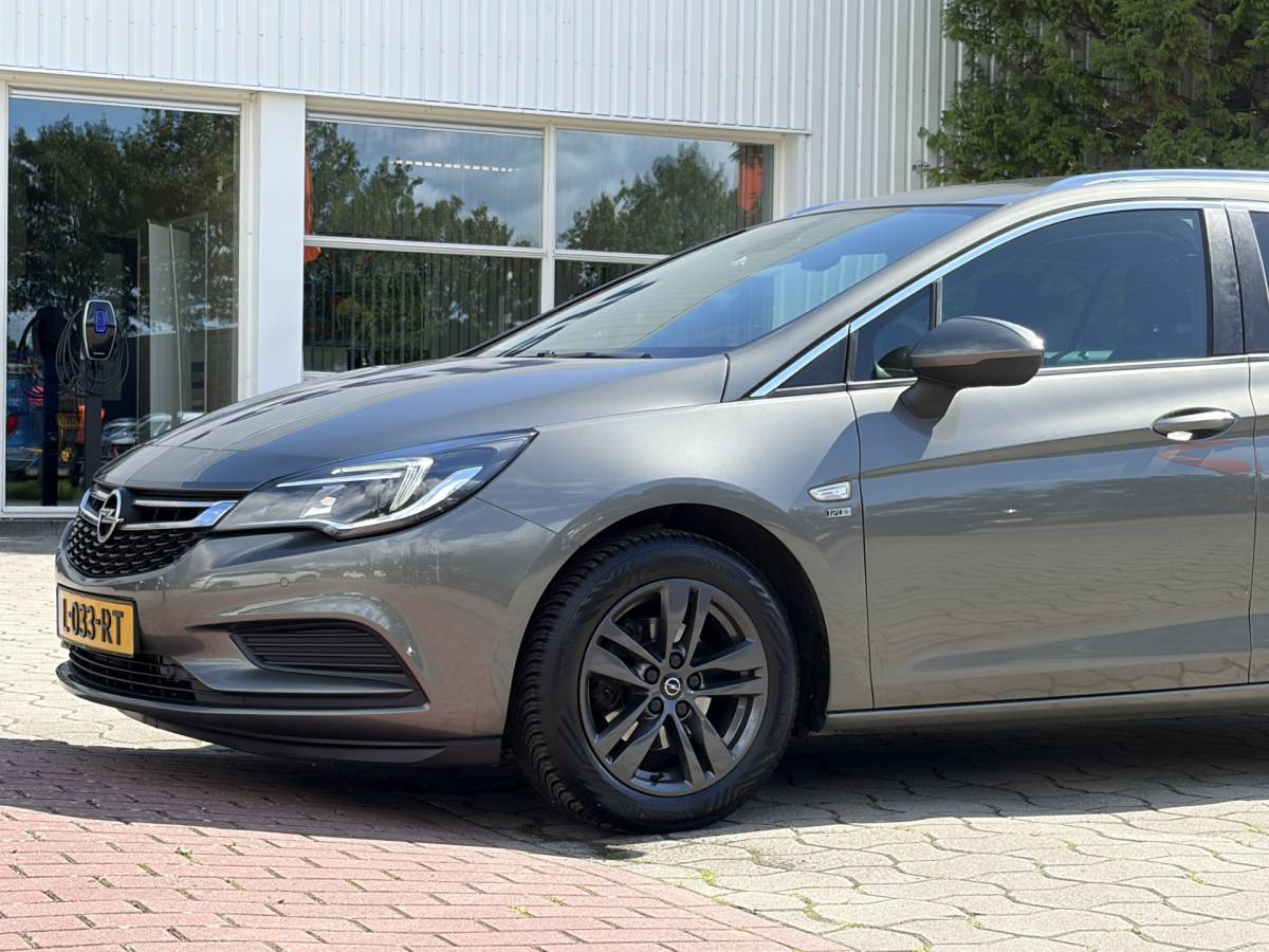 Opel Astra Opel Astra Sports Tourer 1.0 Turbo 120 Jaar Edition | Camera | Navi | Cruise | Rijklaar met beurt & garantie!