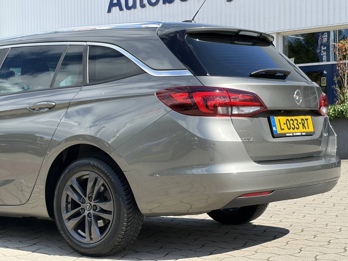 Opel Astra Opel Astra Sports Tourer 1.0 Turbo 120 Jaar Edition | Camera | Navi | Cruise | Rijklaar met beurt & garantie!