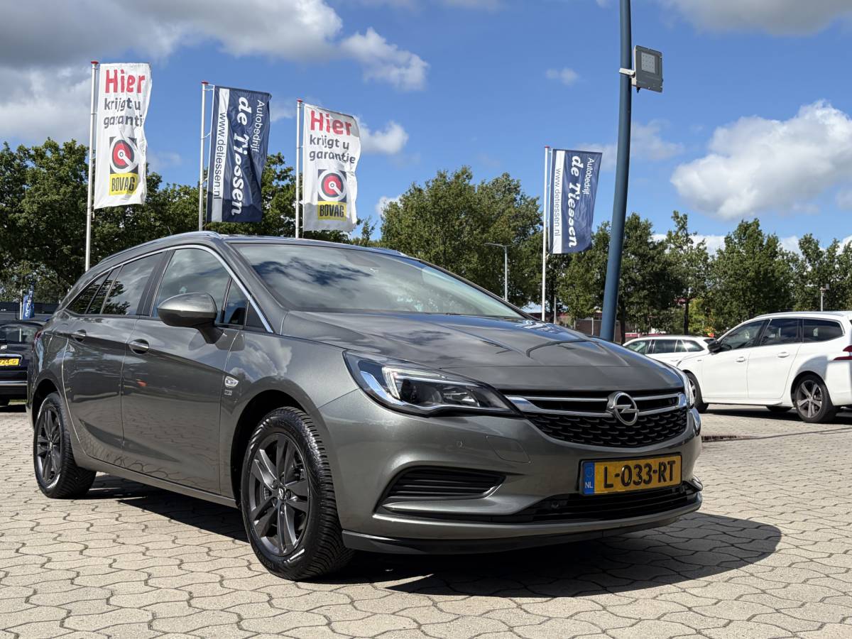 Opel Astra Opel Astra Sports Tourer 1.0 Turbo 120 Jaar Edition | Camera | Navi | Cruise | Rijklaar met beurt & garantie!