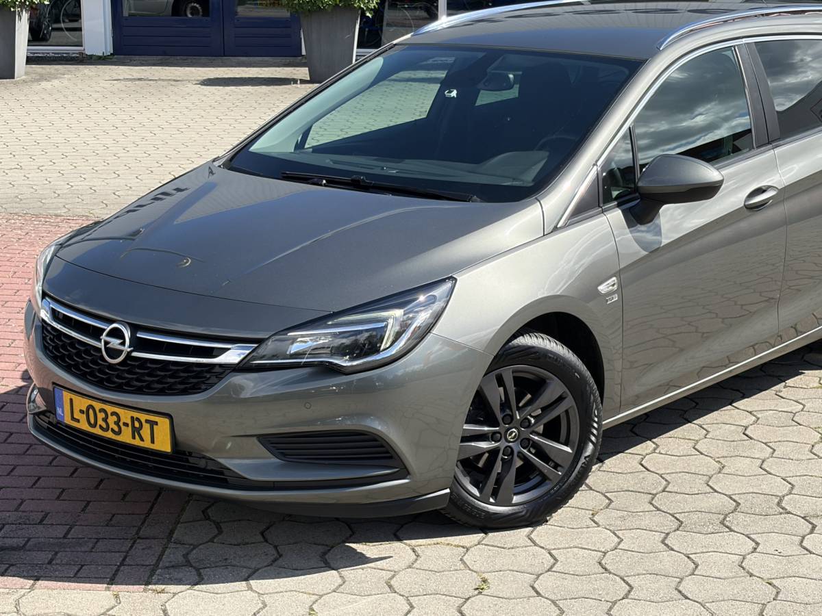 Opel Astra Opel Astra Sports Tourer 1.0 Turbo 120 Jaar Edition | Camera | Navi | Cruise | Rijklaar met beurt & garantie!