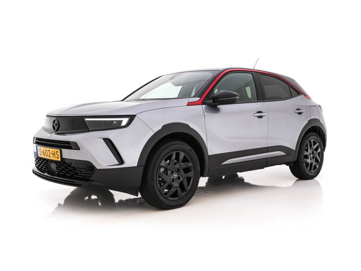 Opel Mokka-e Opel Mokka Electric Level 4 50 kWh [3-Fase-11kW] {SoH-95%} (INCL.BTW) Aut. *HEATPUMP | LEATHER-FABRIC | DIGI-COCKPIT | FULL-LED | CAMERA | COMFORTSEATS | KEYLESS | DAB+ | ECC | CRUISE | 17”ALU*