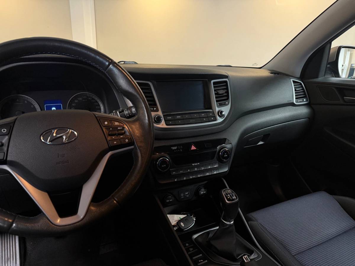 Hyundai Tucson Hyundai Tucson 1.6 GDi Premium *Dealer OH* Stoel/Stuurverw.|Camera|Cruise|Navi|19” Velgen|BT|PDC|Sidebars