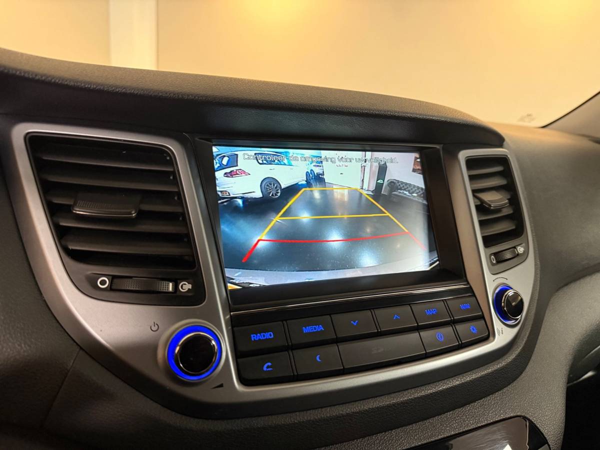 Hyundai Tucson Hyundai Tucson 1.6 GDi Premium *Dealer OH* Stoel/Stuurverw.|Camera|Cruise|Navi|19” Velgen|BT|PDC|Sidebars