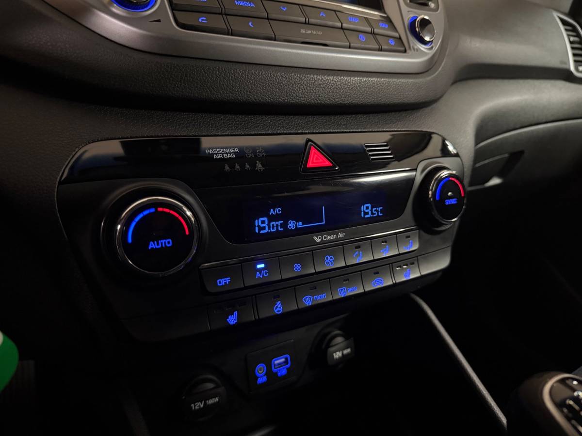 Hyundai Tucson Hyundai Tucson 1.6 GDi Premium *Dealer OH* Stoel/Stuurverw.|Camera|Cruise|Navi|19” Velgen|BT|PDC|Sidebars