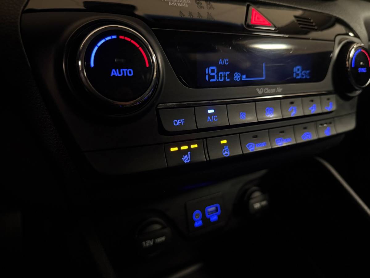 Hyundai Tucson Hyundai Tucson 1.6 GDi Premium *Dealer OH* Stoel/Stuurverw.|Camera|Cruise|Navi|19” Velgen|BT|PDC|Sidebars