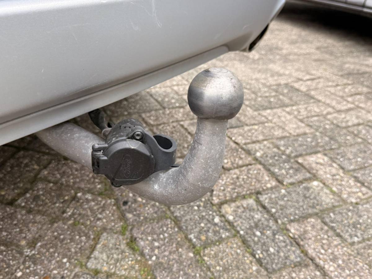 Ford Kuga Ford Kuga 2.5 PHEV Titanium 225pk | Wegklapbare  Trekhaak | AGR Stoelen | Winter Pack | Adaptieve Cruise Control | Reservewiel | Achteruitrijcamera