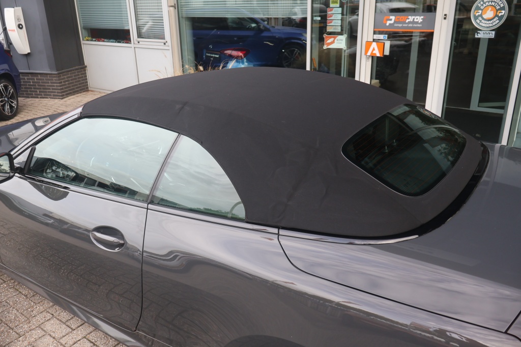 BMW 4 Serie BMW 4-Serie Cabrio (g23) 420i M-Sport 184pk | Dravitgrau | Carbon | ACC | Climate | HUD | Stoelverwarming | Camera