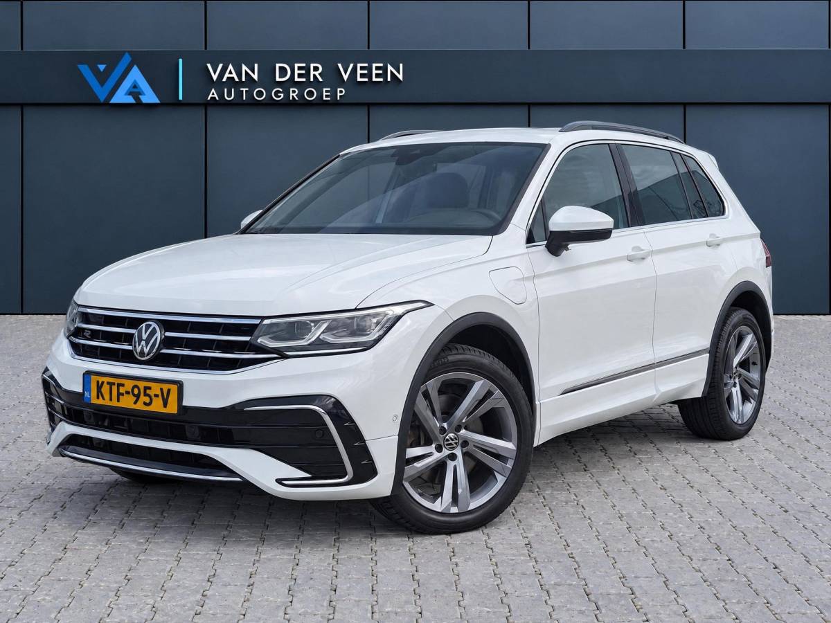Volkswagen Tiguan Volkswagen Tiguan 1.4 TSI eHybrid R-Line Business+ | Incl. 12 maanden garantie | SOH 92% | Stoel/stuurverwarming | Parkeercamera | Wegklapbare trekhaak | DAB radio | Apple carplay/Android auto | 100% dealer onderhouden |