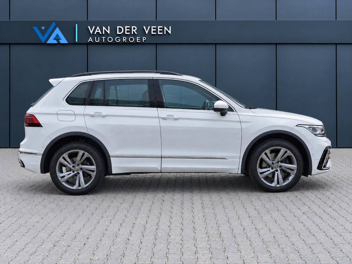 Volkswagen Tiguan Volkswagen Tiguan 1.4 TSI eHybrid R-Line Business+ | Incl. 12 maanden garantie | SOH 92% | Stoel/stuurverwarming | Parkeercamera | Wegklapbare trekhaak | DAB radio | Apple carplay/Android auto | 100% dealer onderhouden |