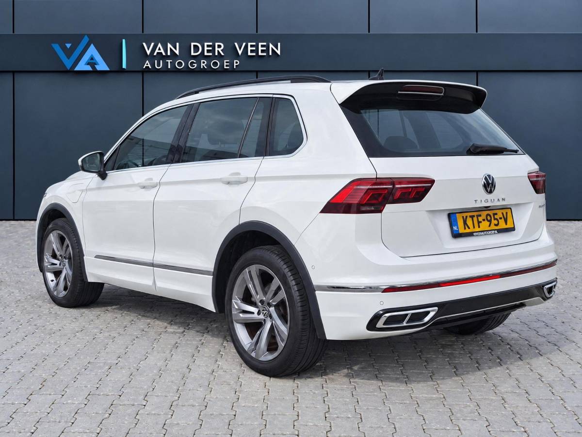 Volkswagen Tiguan Volkswagen Tiguan 1.4 TSI eHybrid R-Line Business+ | Incl. 12 maanden garantie | SOH 92% | Stoel/stuurverwarming | Parkeercamera | Wegklapbare trekhaak | DAB radio | Apple carplay/Android auto | 100% dealer onderhouden |
