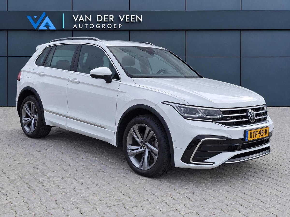 Volkswagen Tiguan Volkswagen Tiguan 1.4 TSI eHybrid R-Line Business+ | Incl. 12 maanden garantie | SOH 92% | Stoel/stuurverwarming | Parkeercamera | Wegklapbare trekhaak | DAB radio | Apple carplay/Android auto | 100% dealer onderhouden |