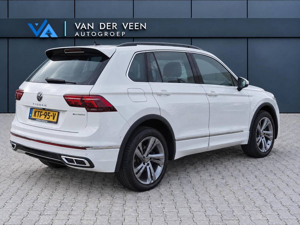 Volkswagen Tiguan Volkswagen Tiguan 1.4 TSI eHybrid R-Line Business+ | Incl. 12 maanden garantie | SOH 92% | Stoel/stuurverwarming | Parkeercamera | Wegklapbare trekhaak | DAB radio | Apple carplay/Android auto | 100% dealer onderhouden |