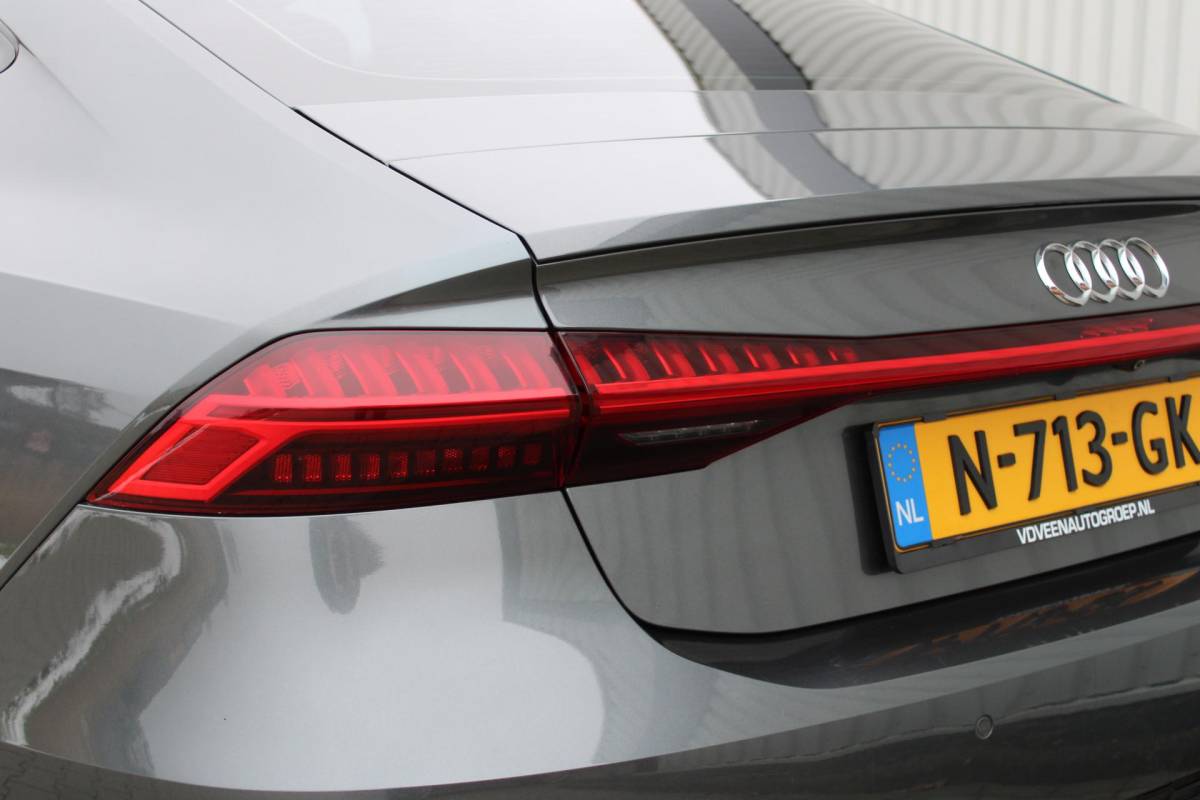 Audi A7 Audi A7 Sportback 55 TFSI quattro Pro Line S | Incl. 12 maanden garantie | Schuif/kantel panorama dak | 360° camera | Head-up display | Wegklapbare trekhaak | Matrix koplampen | Soft close | Memory zetels | Dode hoek detectie | Elektrische achterklep | Bowers & Wilkens | Standkachel |