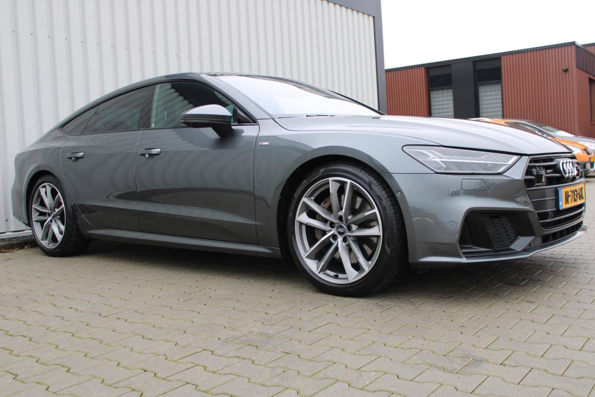 Audi A7 Audi A7 Sportback 55 TFSI quattro Pro Line S | Incl. 12 maanden garantie | Schuif/kantel panorama dak | 360° camera | Head-up display | Wegklapbare trekhaak | Matrix koplampen | Soft close | Memory zetels | Dode hoek detectie | Elektrische achterklep | Bowers & Wilkens | Standkachel |