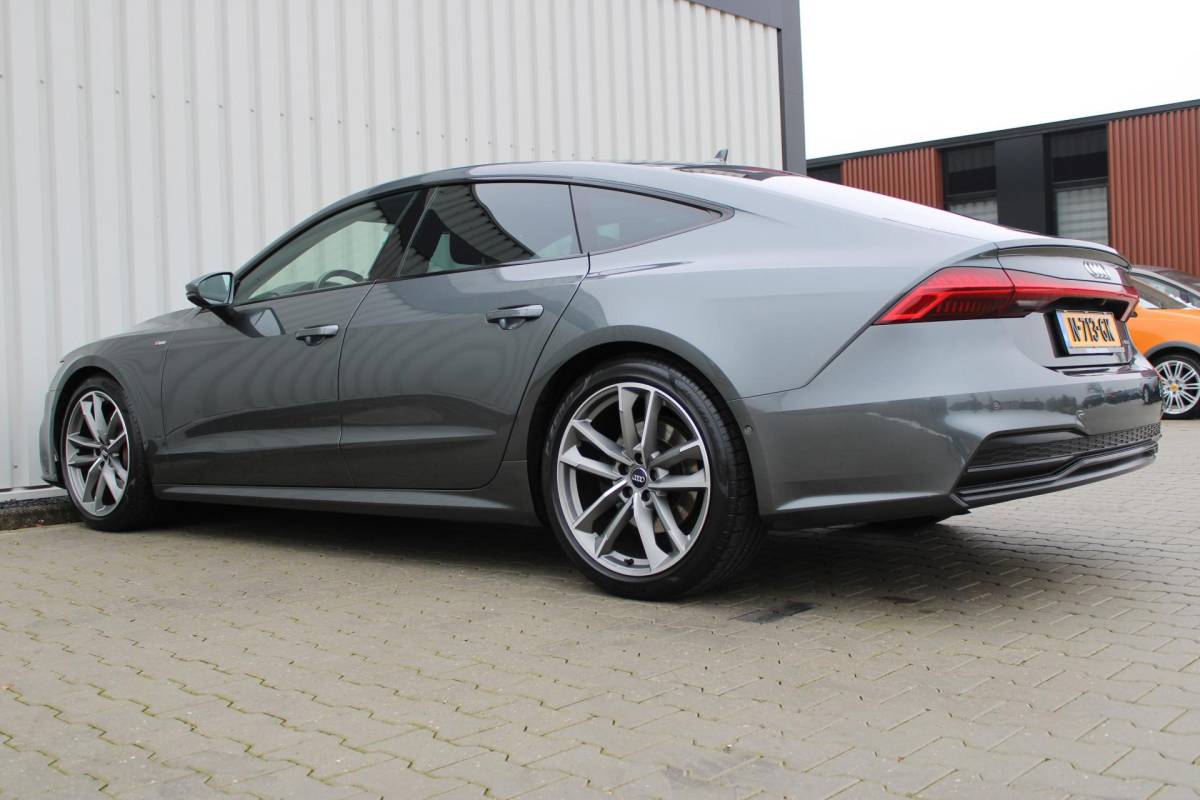 Audi A7 Audi A7 Sportback 55 TFSI quattro Pro Line S | Incl. 12 maanden garantie | Schuif/kantel panorama dak | 360° camera | Head-up display | Wegklapbare trekhaak | Matrix koplampen | Soft close | Memory zetels | Dode hoek detectie | Elektrische achterklep | Bowers & Wilkens | Standkachel |