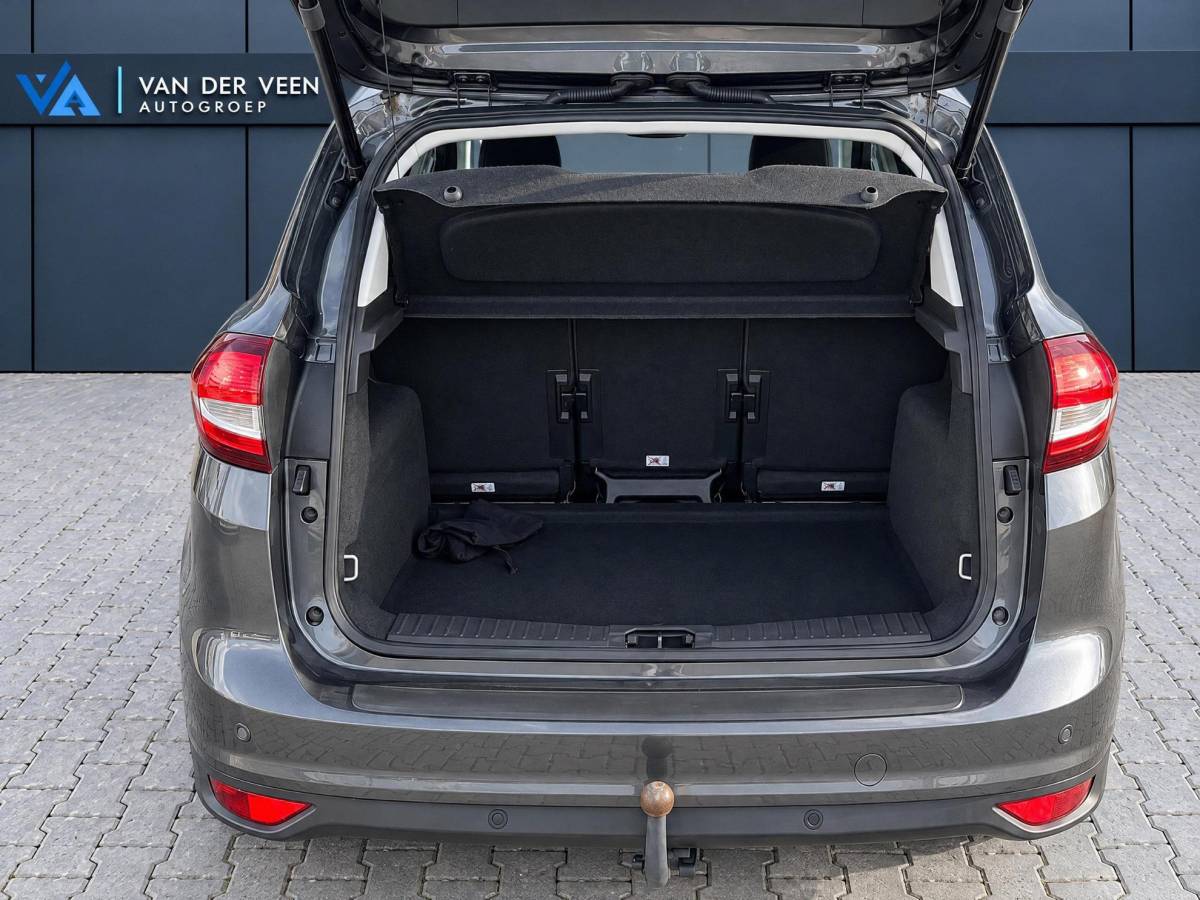 Ford C-MAX Ford C-Max 1.5 Titanium | Incl. 12 maanden garantie | Trekhaak | Achteruitrijcamera | Parkeersensoren | Elektrische kofferklep | Adaptieve cruise control | Climate control | Lane assist | Navigatie | Bluetooth | Lichtmetalen velgen | Airco