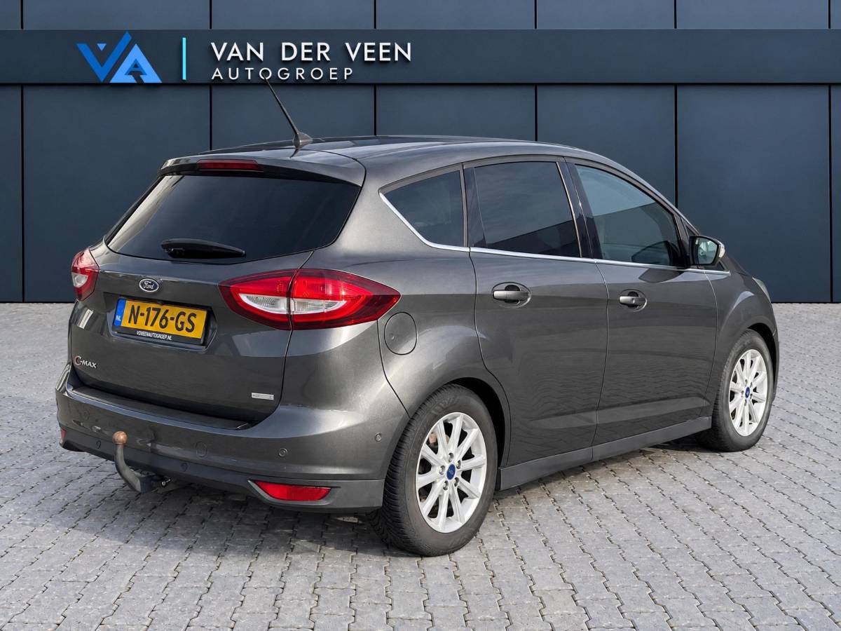 Ford C-MAX Ford C-Max 1.5 Titanium | Incl. 12 maanden garantie | Trekhaak | Achteruitrijcamera | Parkeersensoren | Elektrische kofferklep | Adaptieve cruise control | Climate control | Lane assist | Navigatie | Bluetooth | Lichtmetalen velgen | Airco