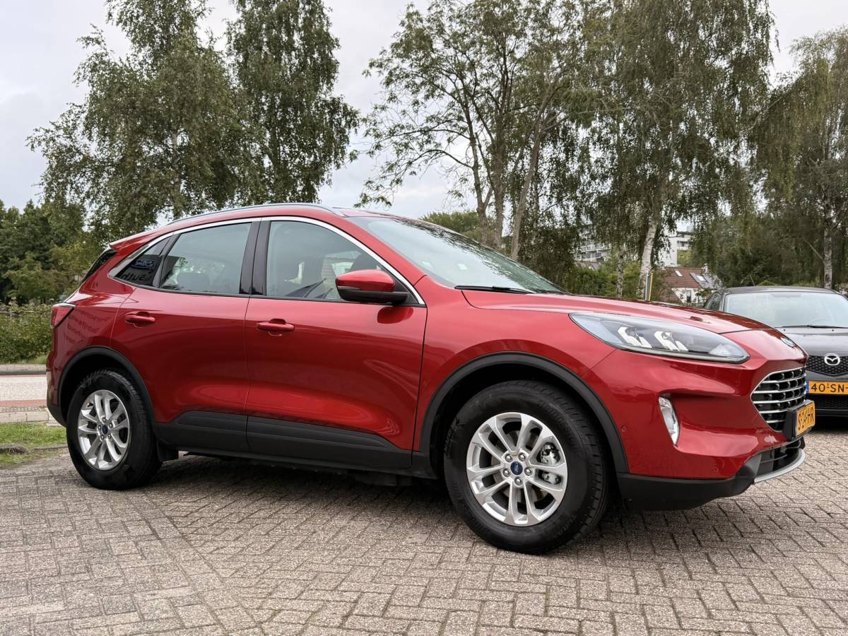 Ford Kuga Ford Kuga 2.5 PHEV Titanium 225pk | Wegklapbare  Trekhaak | AGR Stoelen | Winter Pack | Adaptieve Cruise Control | Reservewiel | Achteruitrijcamera