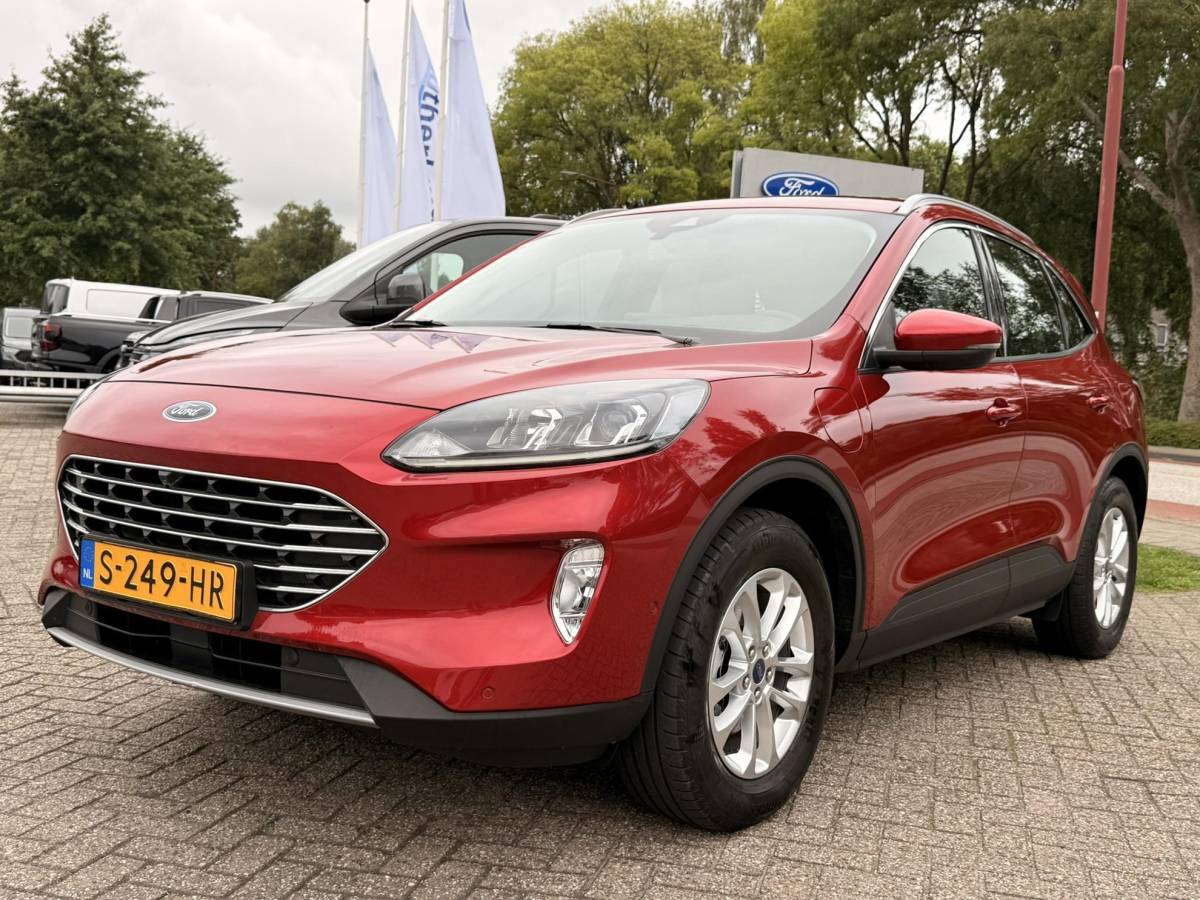 Ford Kuga Ford Kuga 2.5 PHEV Titanium 225pk | Wegklapbare  Trekhaak | AGR Stoelen | Winter Pack | Adaptieve Cruise Control | Reservewiel | Achteruitrijcamera