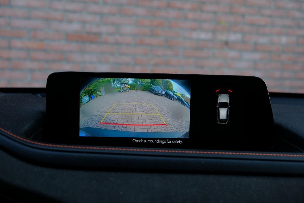 Mazda CX-30 Mazda CX-30 2.5 e-SkyActiv-G M Hybrid 140pk Aut. Nagisa – Head-up display – Bose – Adaptieve cruise – Achteruitrijcamera – Dodehoekdetectie – Stoelverwarming – Elektrische achterklep – Keyless