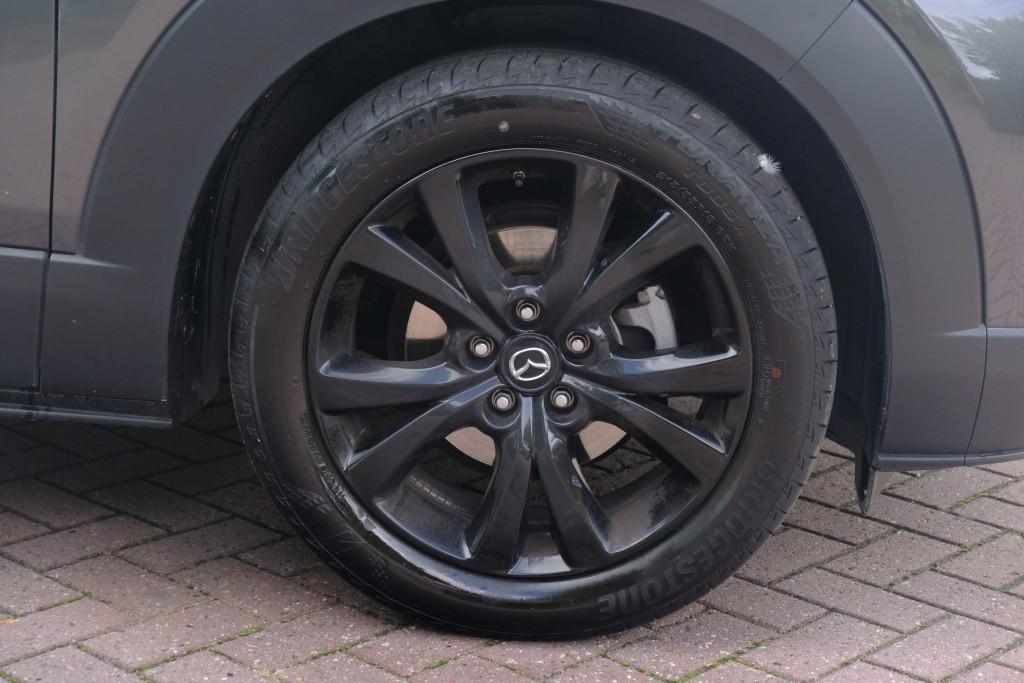 Mazda CX-30 Mazda CX-30 2.5 e-SkyActiv-G M Hybrid 140pk Aut. Nagisa – Head-up display – Bose – Adaptieve cruise – Achteruitrijcamera – Dodehoekdetectie – Stoelverwarming – Elektrische achterklep – Keyless