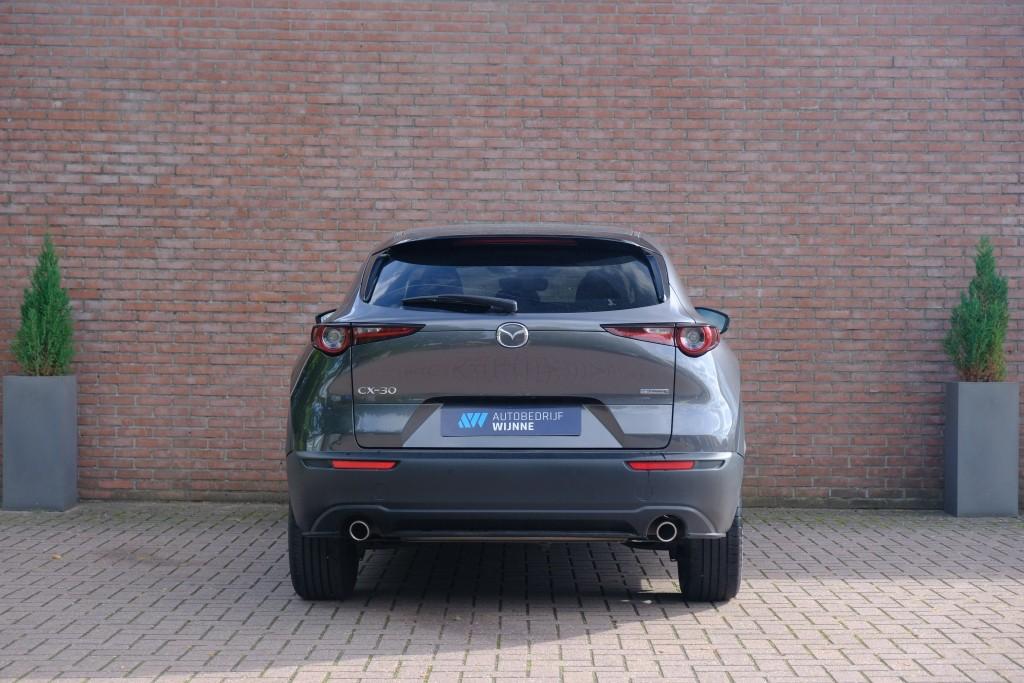 Mazda CX-30 Mazda CX-30 2.5 e-SkyActiv-G M Hybrid 140pk Aut. Nagisa – Head-up display – Bose – Adaptieve cruise – Achteruitrijcamera – Dodehoekdetectie – Stoelverwarming – Elektrische achterklep – Keyless