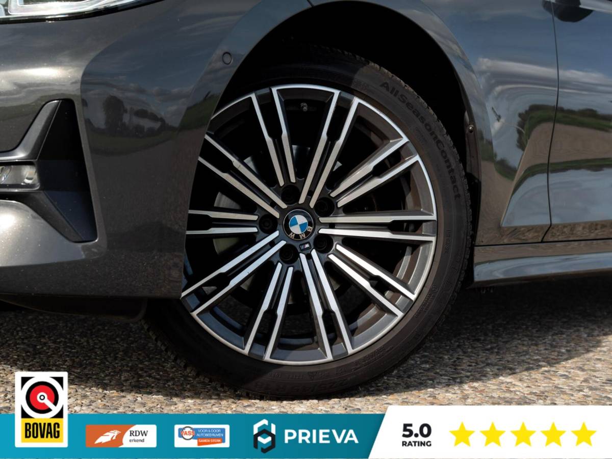 BMW 3 Serie BMW 3-serie Touring 320d High Executive | Panoramadak | Vernasca leder | Camera