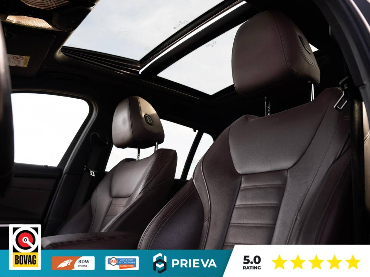 BMW 3 Serie BMW 3-serie Touring 320d High Executive | Panoramadak | Vernasca leder | Camera