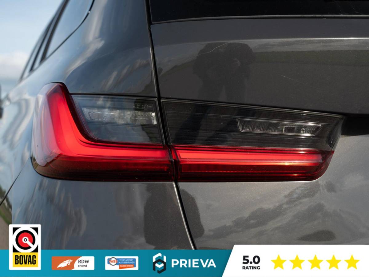 BMW 3 Serie BMW 3-serie Touring 320d High Executive | Panoramadak | Vernasca leder | Camera