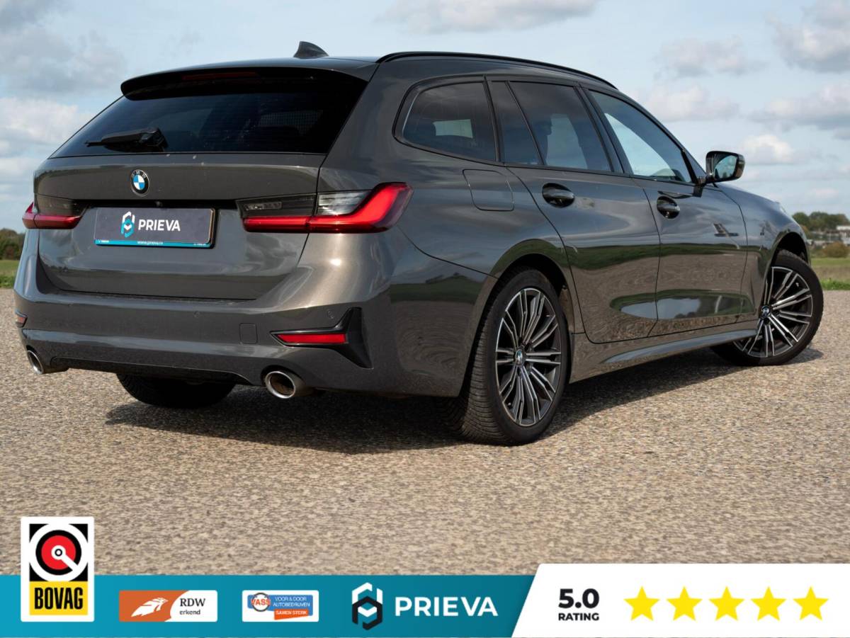 BMW 3 Serie BMW 3-serie Touring 320d High Executive | Panoramadak | Vernasca leder | Camera