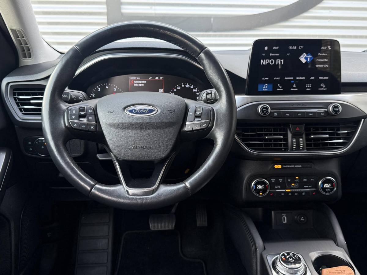 Ford Focus Ford Focus Wagon 1.0 EcoBoost Titanium Business 2e Eigenaar|Navi|Camera|Clima|Cruise|Stoelverwarming|Carplay|APK tot 06-2027