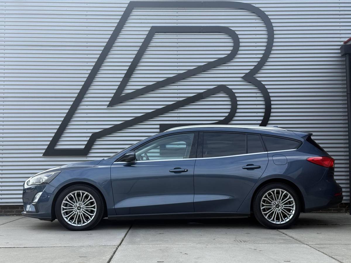Ford Focus Ford Focus Wagon 1.0 EcoBoost Titanium Business 2e Eigenaar|Navi|Camera|Clima|Cruise|Stoelverwarming|Carplay|APK tot 06-2027