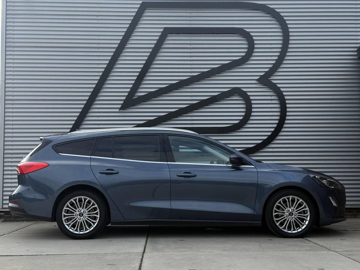 Ford Focus Ford Focus Wagon 1.0 EcoBoost Titanium Business 2e Eigenaar|Navi|Camera|Clima|Cruise|Stoelverwarming|Carplay|APK tot 06-2027