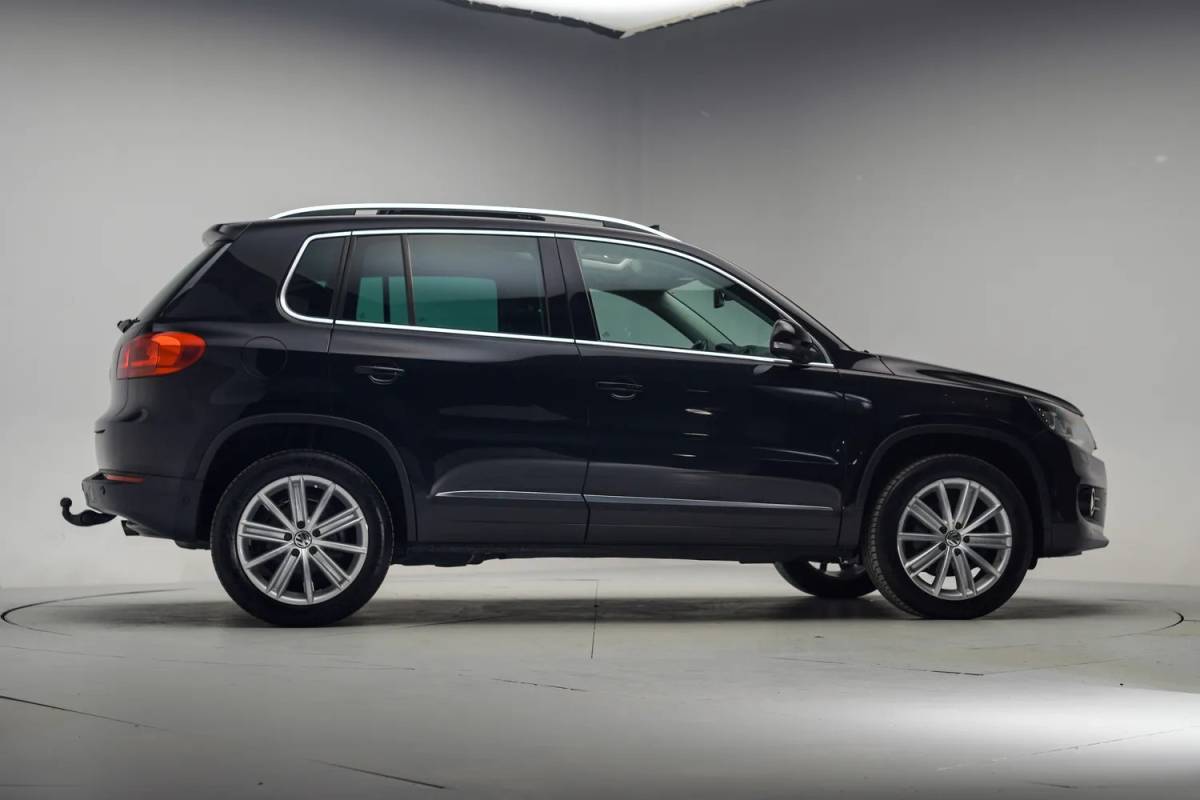 Volkswagen Tiguan Volkswagen Tiguan 2.0 TSI Sport&Style 4Motion Aut. [ Panoramadak Trekhaak Navigatie Camera Stoelverwarming]