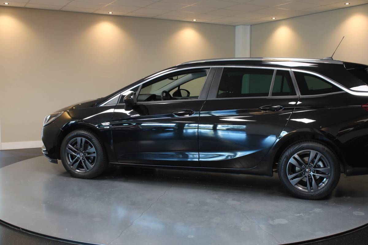 Opel Astra Opel Astra Sports Tourer 1.0 Turbo 120 Jaar Edition *Carplay* Cruise|Lane-Assist|Navi|PDC|All-seasons|DAB|BT|Climate|NAP