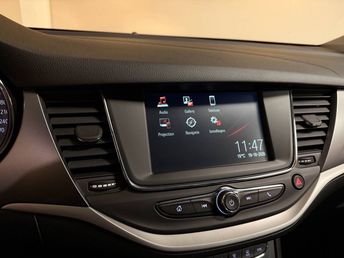 Opel Astra Opel Astra Sports Tourer 1.0 Turbo 120 Jaar Edition *Carplay* Cruise|Lane-Assist|Navi|PDC|All-seasons|DAB|BT|Climate|NAP