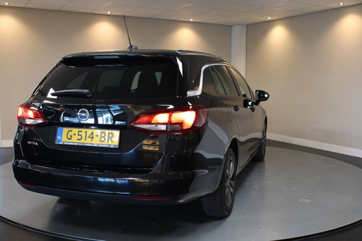 Opel Astra Opel Astra Sports Tourer 1.0 Turbo 120 Jaar Edition *Carplay* Cruise|Lane-Assist|Navi|PDC|All-seasons|DAB|BT|Climate|NAP
