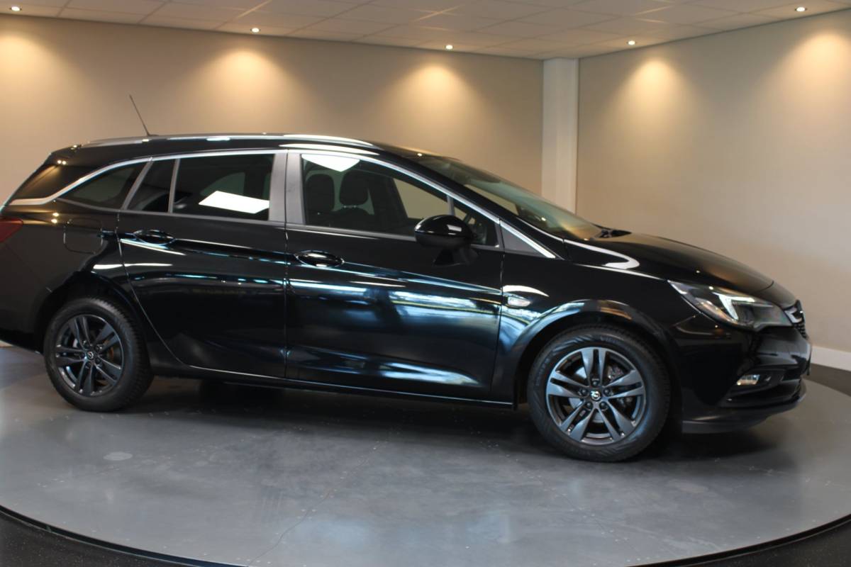 Opel Astra Opel Astra Sports Tourer 1.0 Turbo 120 Jaar Edition *Carplay* Cruise|Lane-Assist|Navi|PDC|All-seasons|DAB|BT|Climate|NAP
